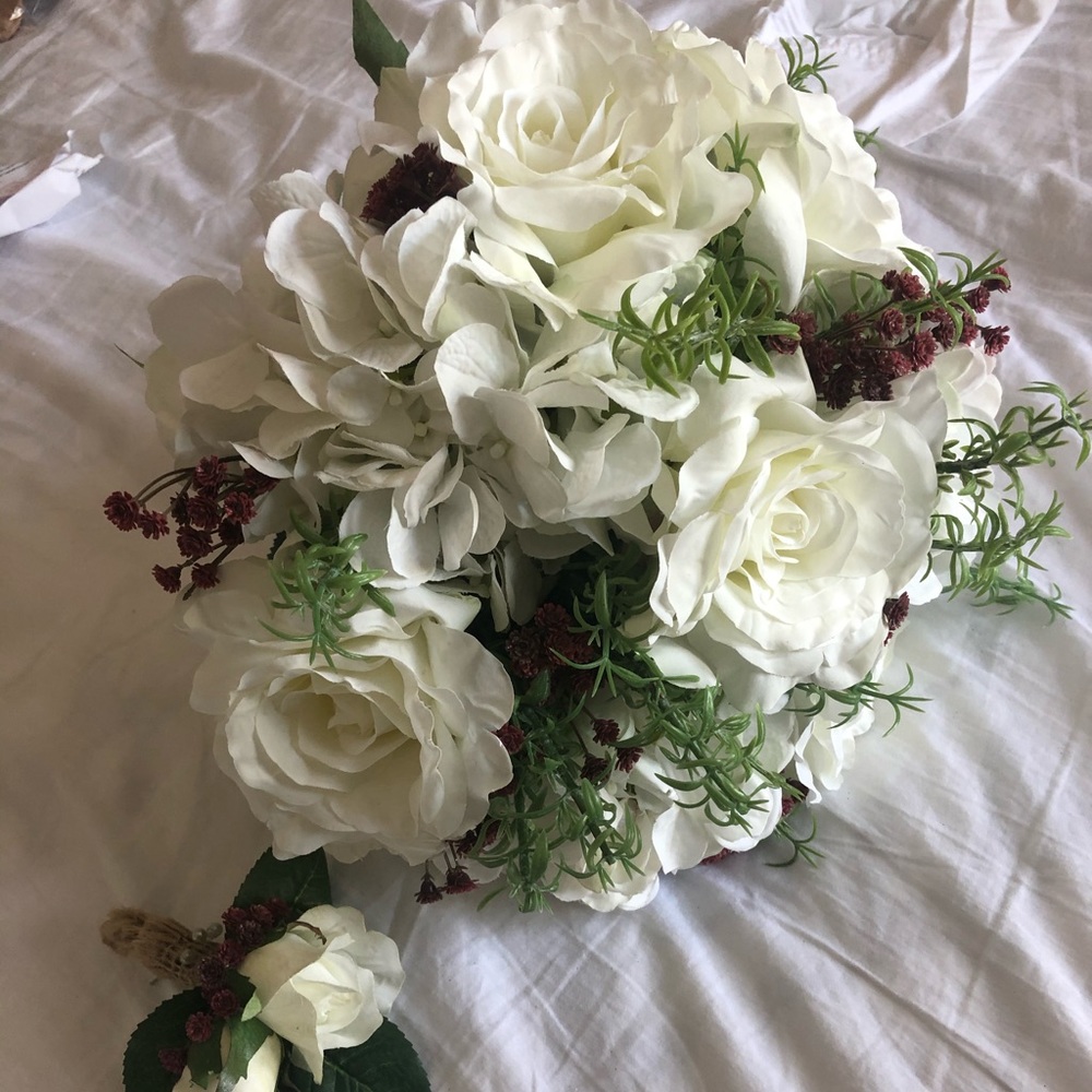 Bridal bouquet and groom flower